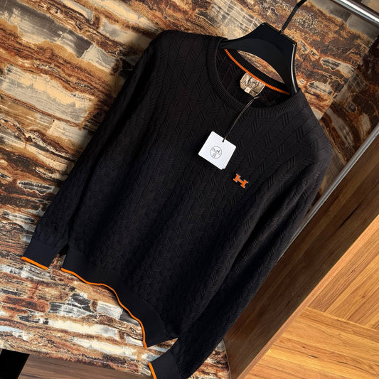 hermes round with orange button